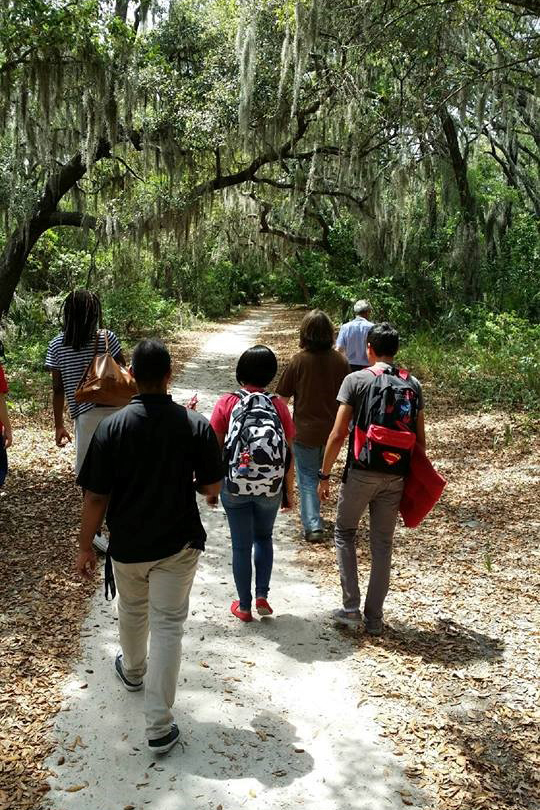 Students walking a trail on the Valencia campus.